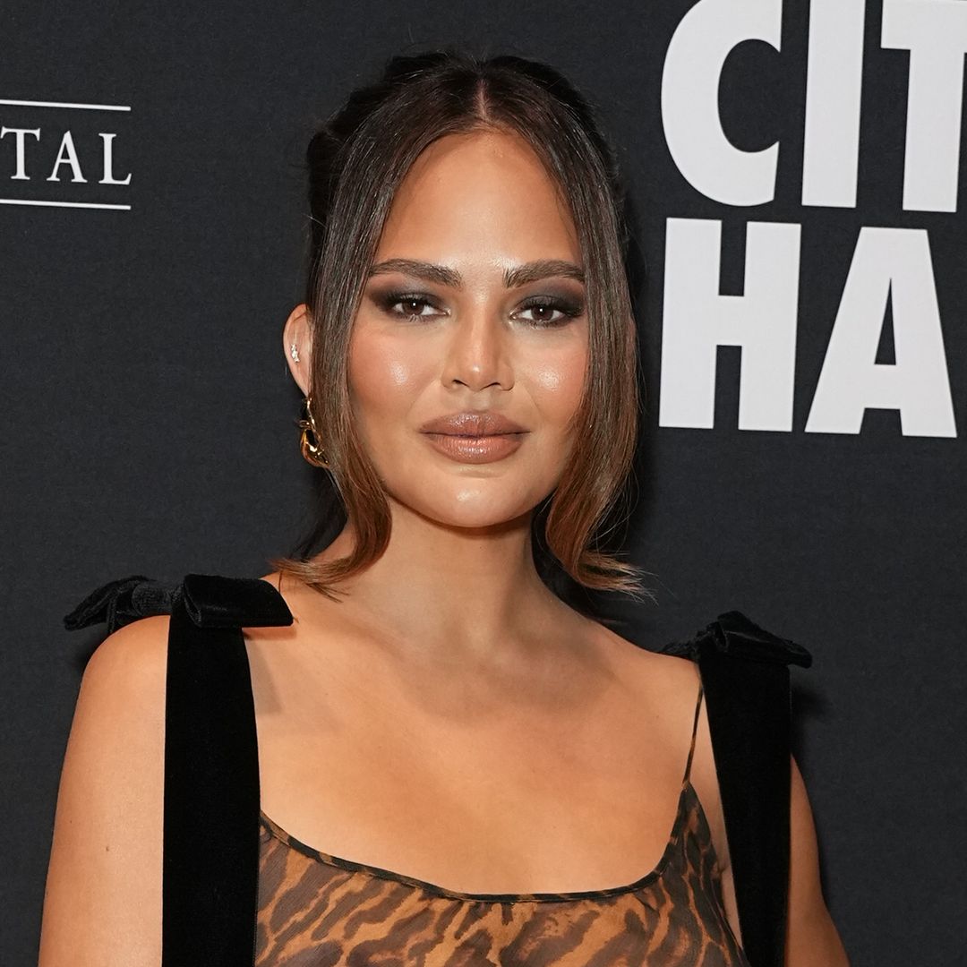 Chrissy Teigen sparks panic after worrying photo of her wearing a neck brace